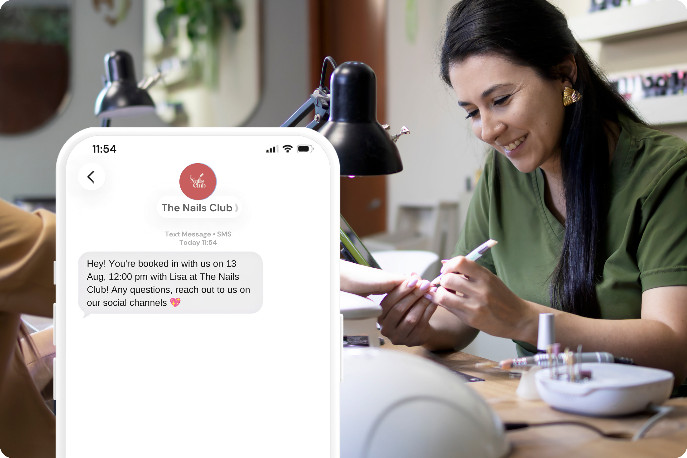 phone on left showing text reminder, woman to the right 