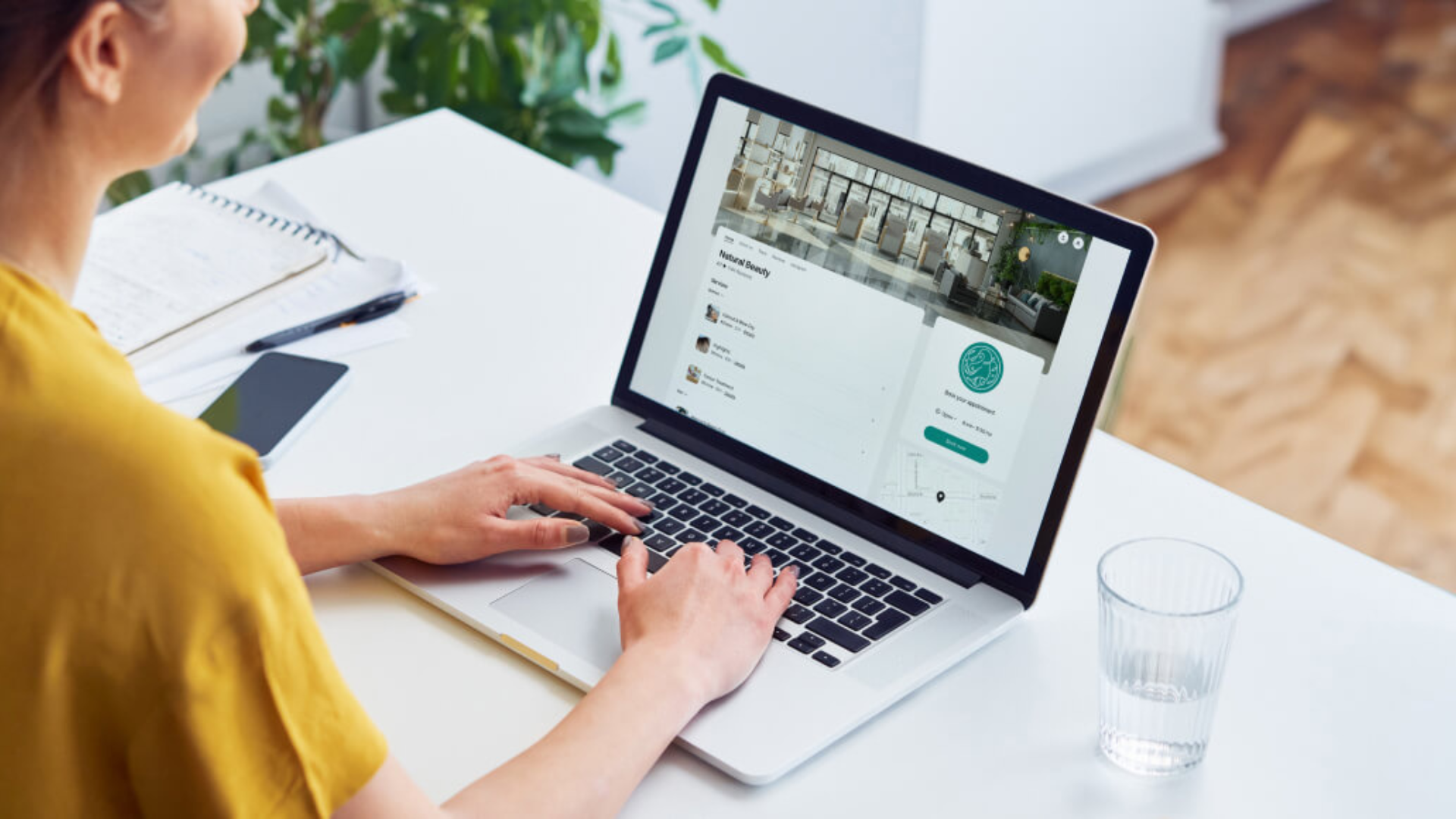 person typing on laptop