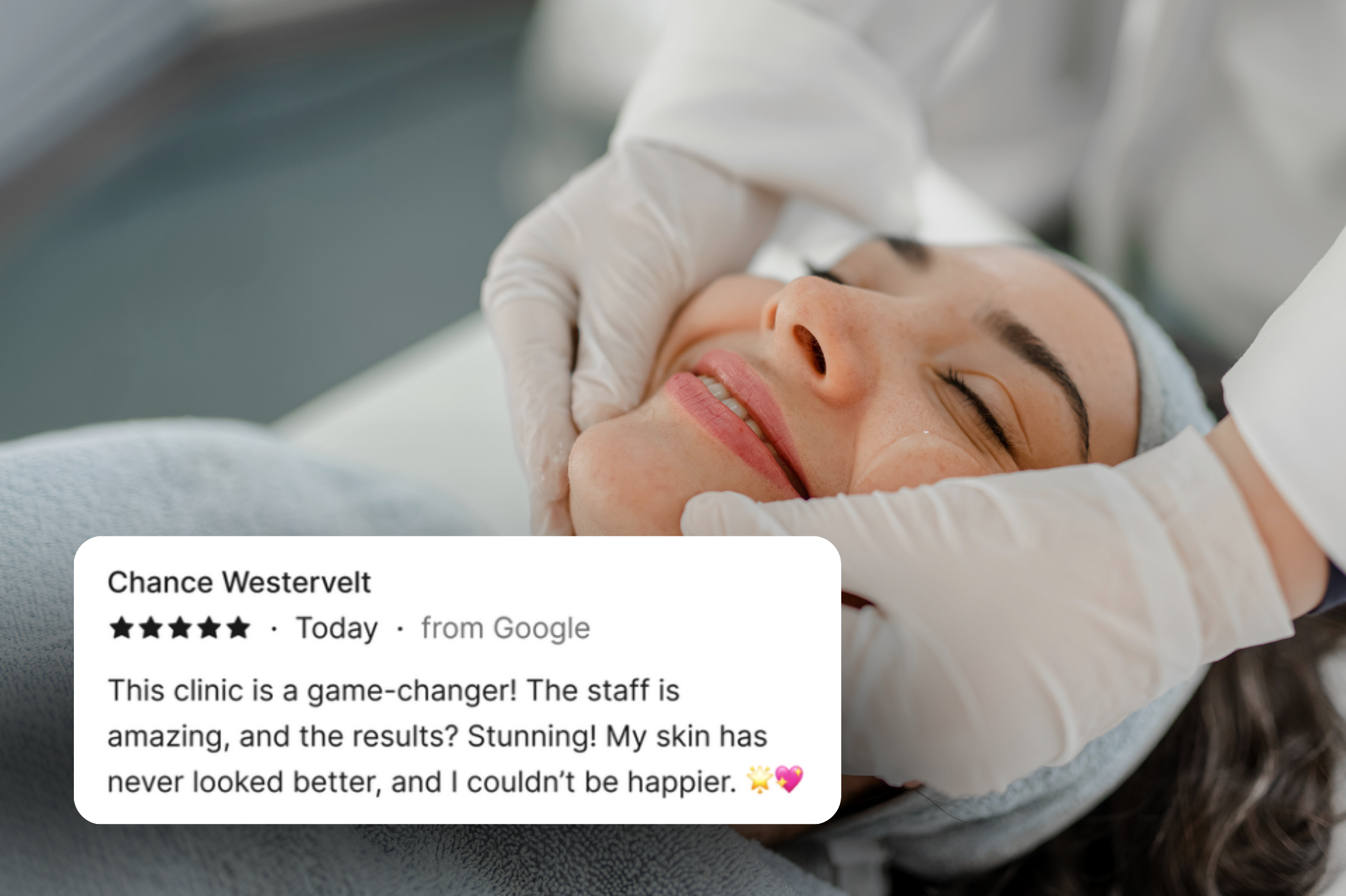woman smiling while having face examined