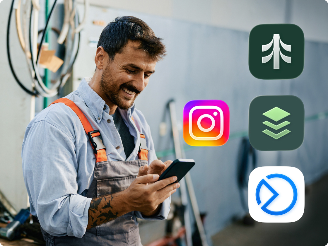 home services specialist checking his phone