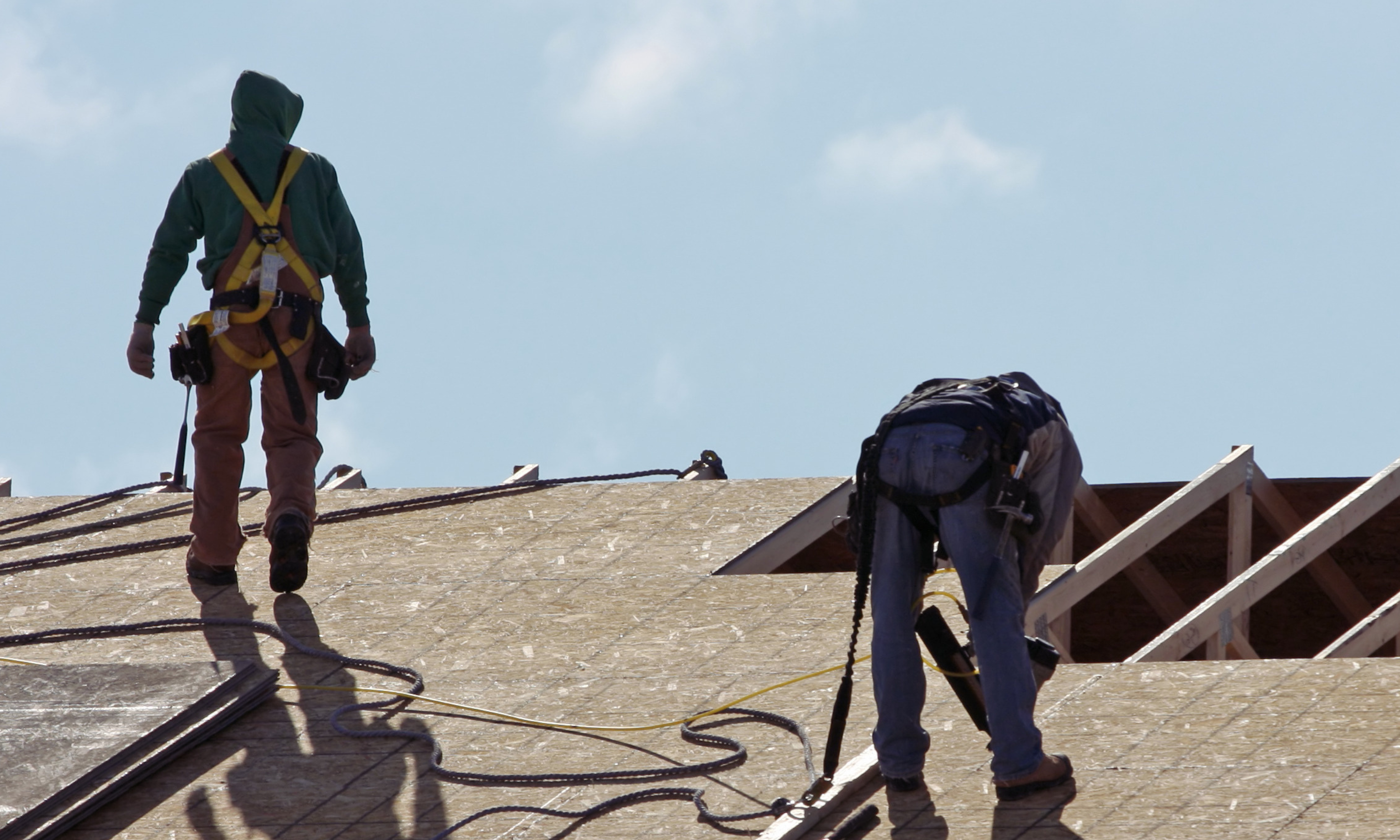two men on roof